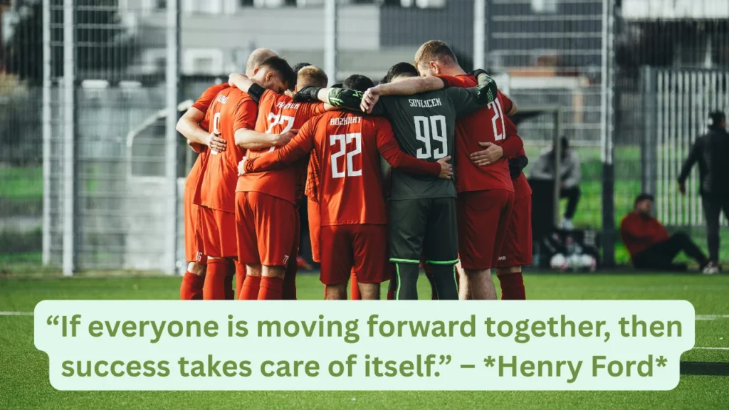 Hands stacked together in team huddle before match.