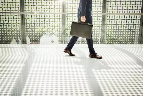Briefcase icon symbolizing workplace leadership